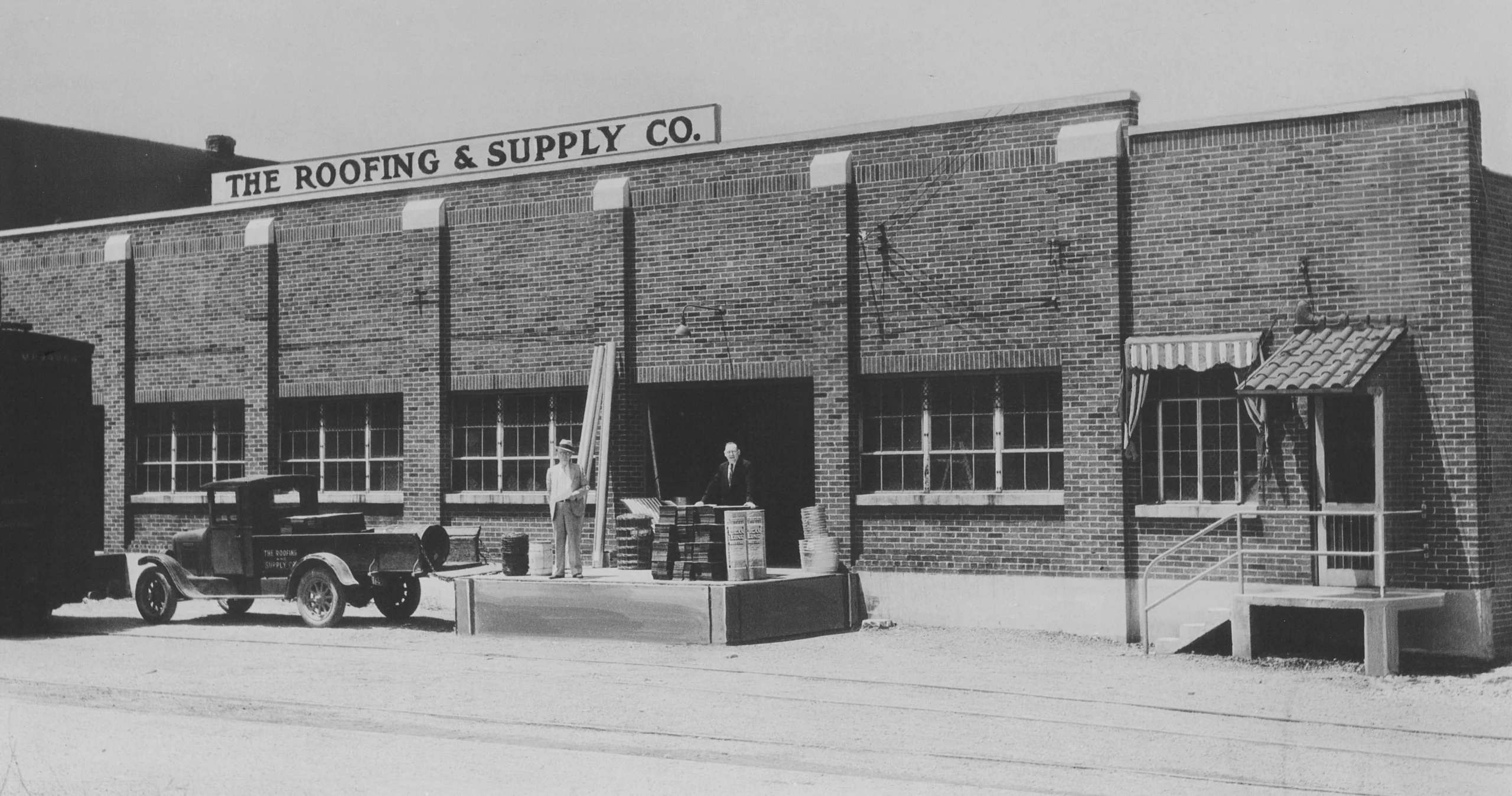 The Roofing & Supply Co. warehouse and delivery truck on Fort Street in the early days